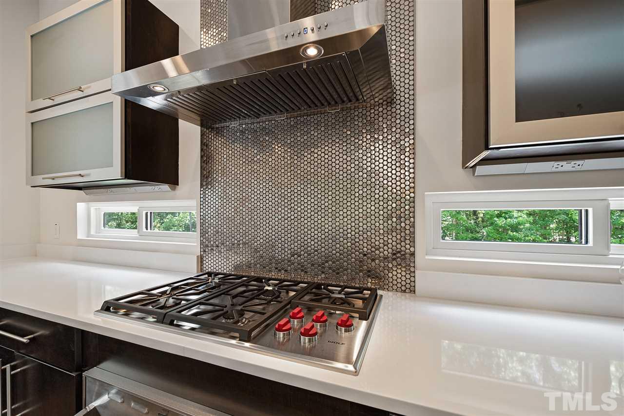 2120 Old Sorrell Road Apex, NC 27539 - Photo 12 of 30 Appliances: New Wolf gas cook-top, Sub-Zero refrigerator, Viking warming oven, KitchenAid wall oven and dishwasher.