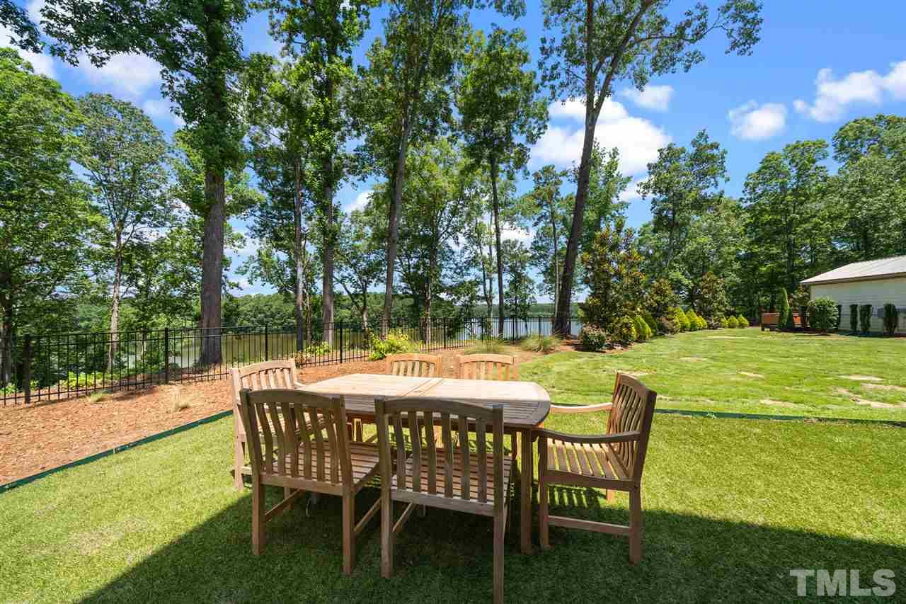 2120 Old Sorrell Road Apex, NC 27539 - Photo 8 of 30 Professionally landscaped and fenced.