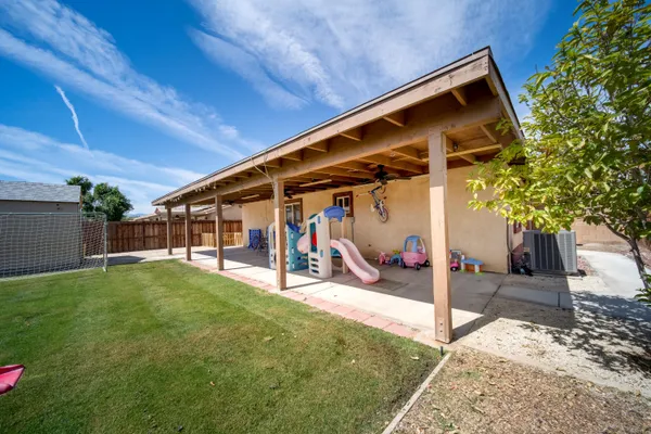 a view of balcony with wooden floor