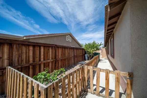 an aerial view of a house with a swimming pool