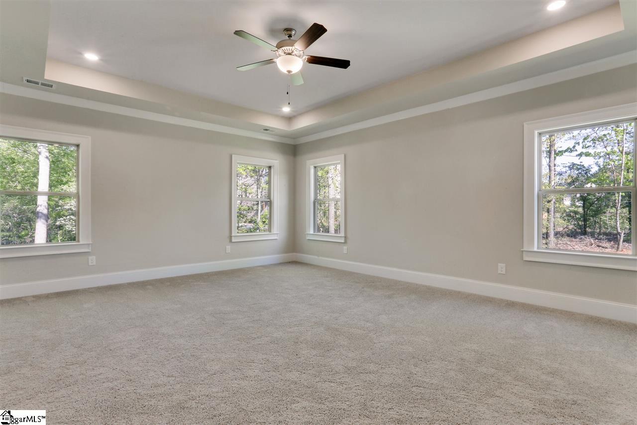 604 Rutland Court, Unit SITE 13 Greer, SC 29651 - Photo 13 of 33 Trey ceiling, added LED lighting, wooded views and sitting area!