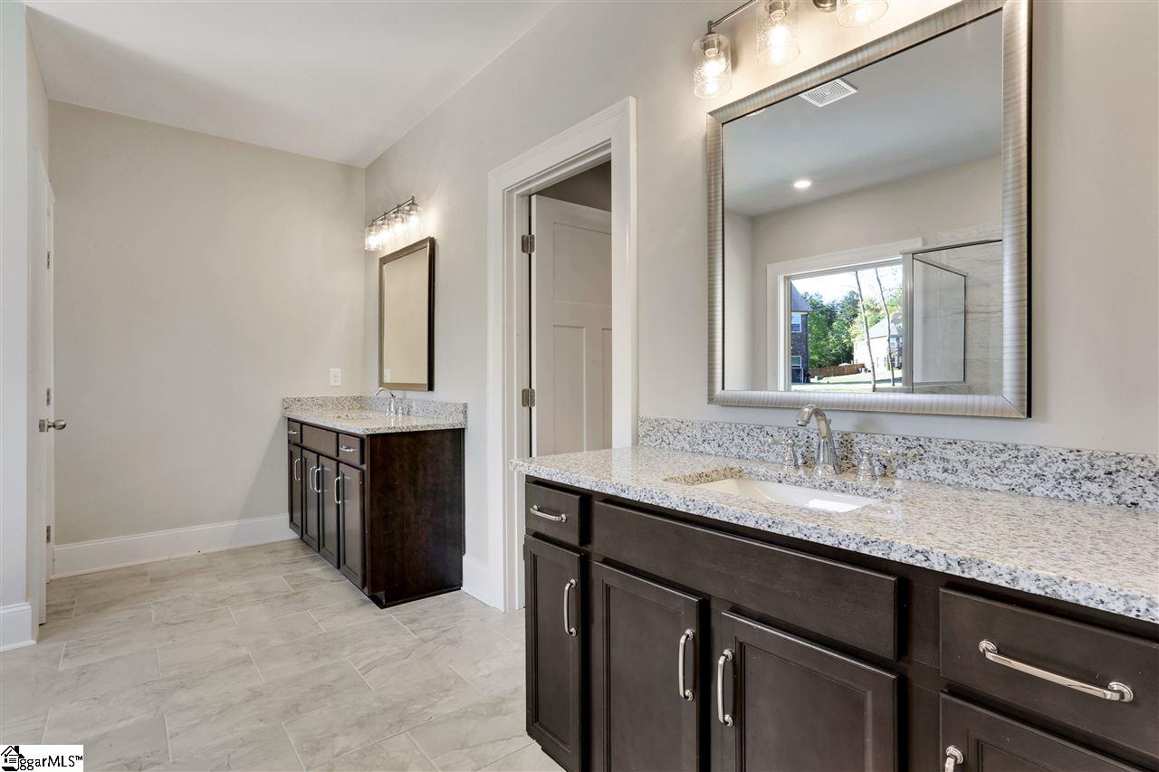 604 Rutland Court, Unit SITE 13 Greer, SC 29651 - Photo 15 of 33 Dual granite comfort height vanities, private water closet and tile flooring!