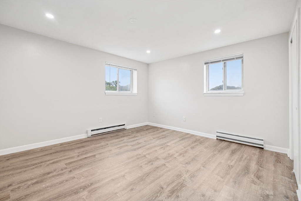 770 Cummins Highway, Unit 22 Boston, MA 02126 - Photo 5 of 28 a view of an empty room