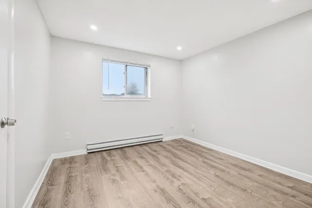 an empty room with a workbench