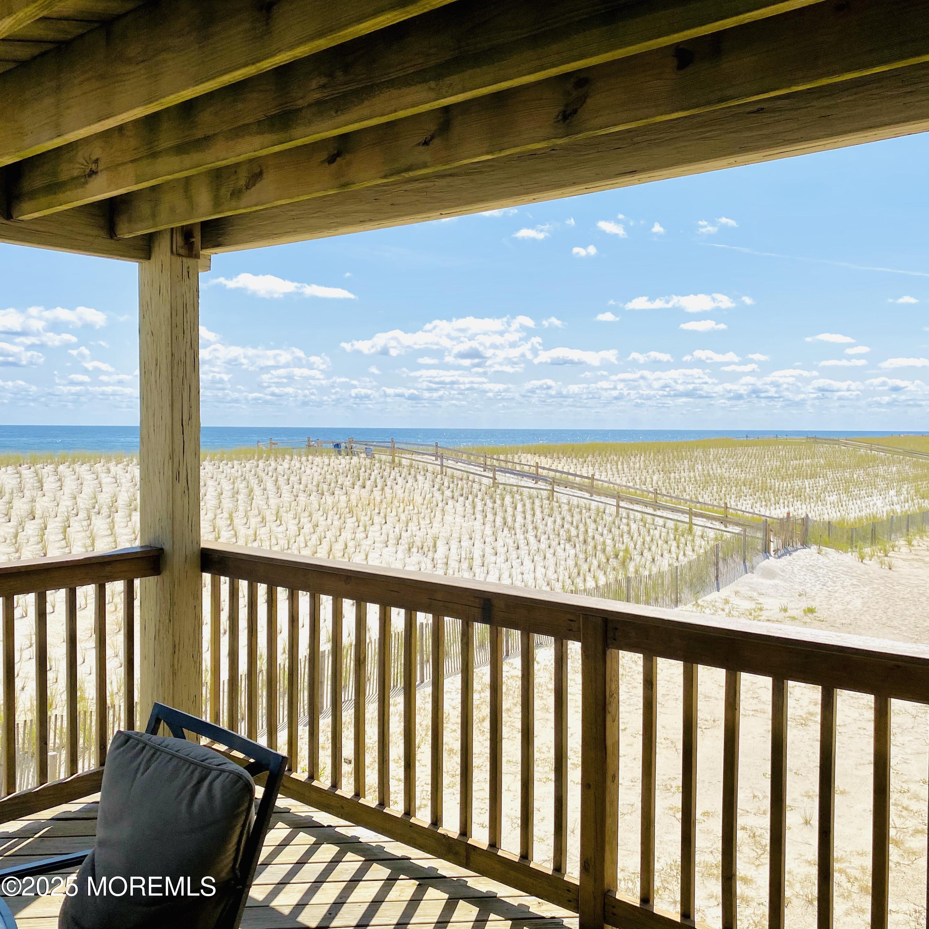 1926 Oceanfront, Unit 14 Seaside Heights, NJ 08751 - Photo 1 of 21 a view of a street from a balcony