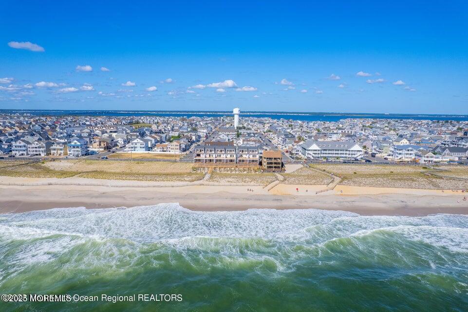 1926 Oceanfront, Unit 14 Seaside Heights, NJ 08751 - Photo 12 of 21 a view of a swimming pool and an ocean view