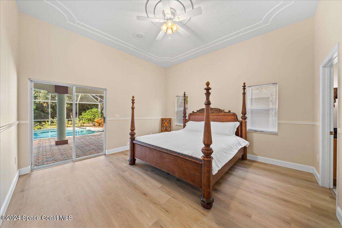 4360 Canard Road Melbourne, FL 32934 - Photo 11 of 54 a living room with furniture and a chandelier