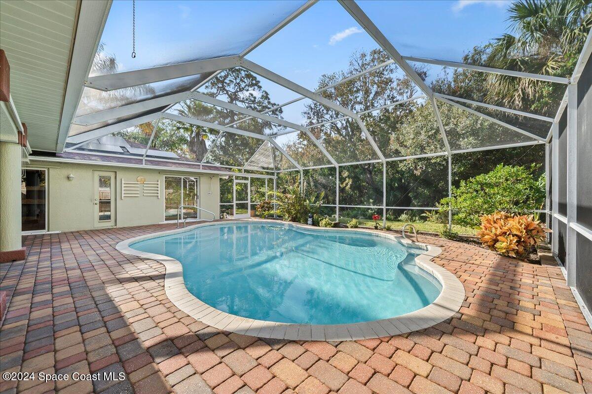 4360 Canard Road Melbourne, FL 32934 - Photo 20 of 54 a view of a house with swimming pool
