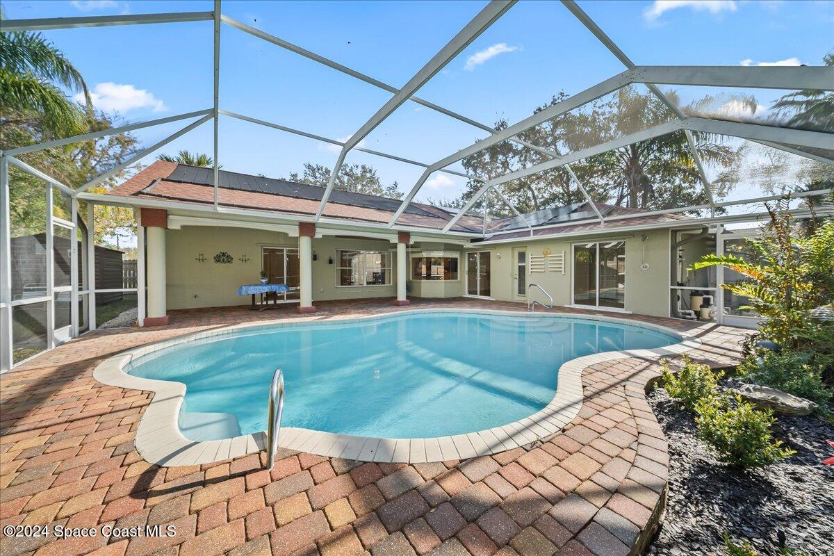 4360 Canard Road Melbourne, FL 32934 - Photo 2 of 54 a view of a house with a backyard