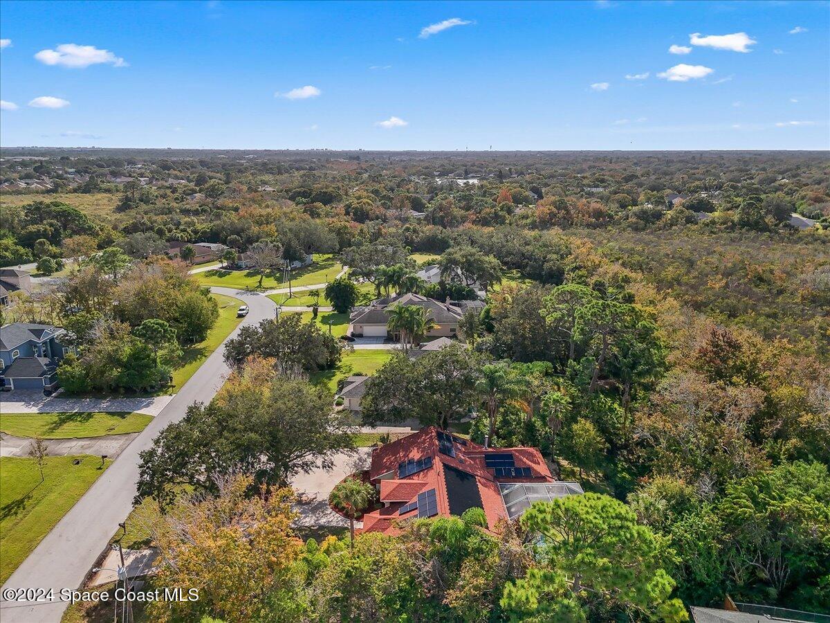 4360 Canard Road Melbourne, FL 32934 - Photo 36 of 54 an aerial view of residential houses with outdoor space and swimming pool