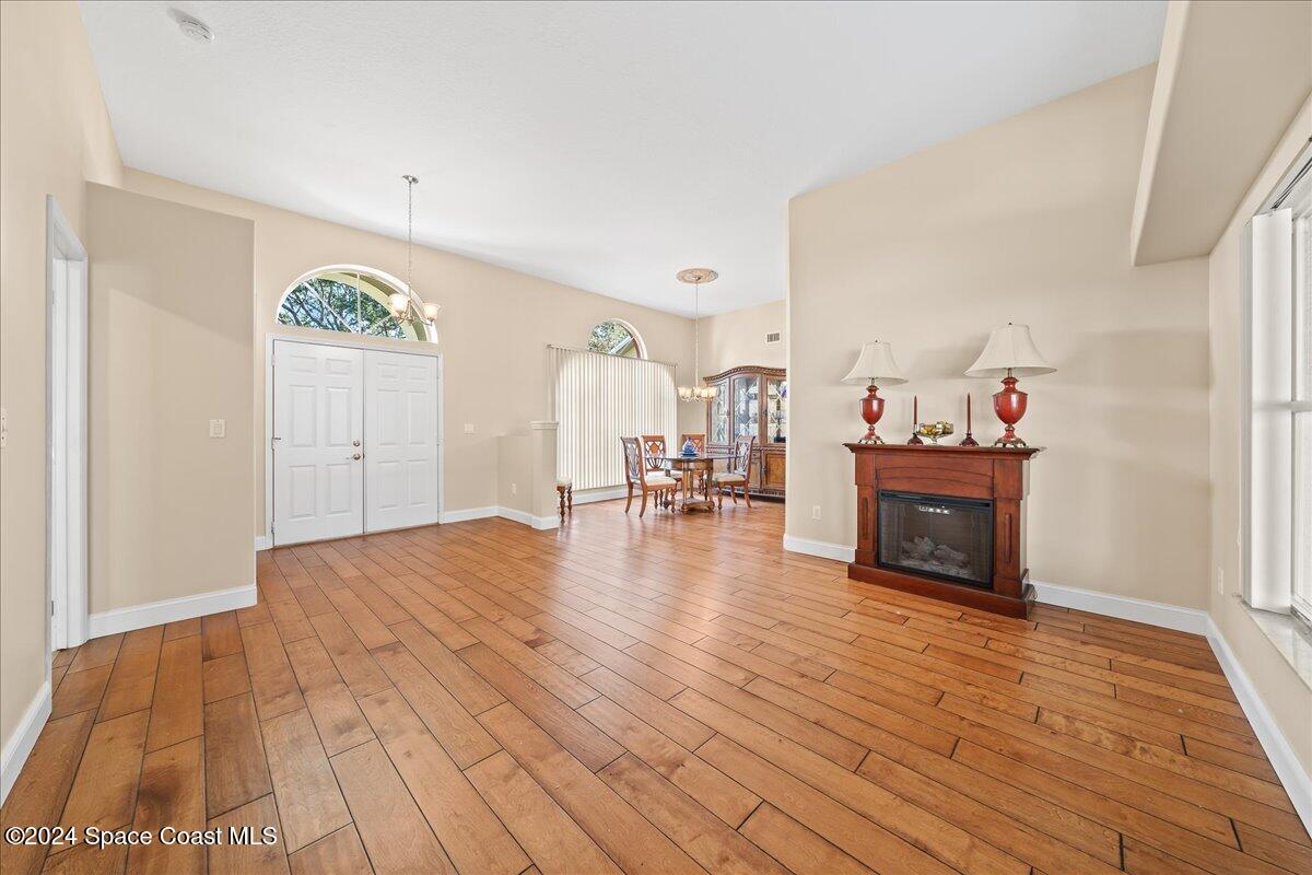 4360 Canard Road Melbourne, FL 32934 - Photo 4 of 54 a view of a room wooden floor and staircase