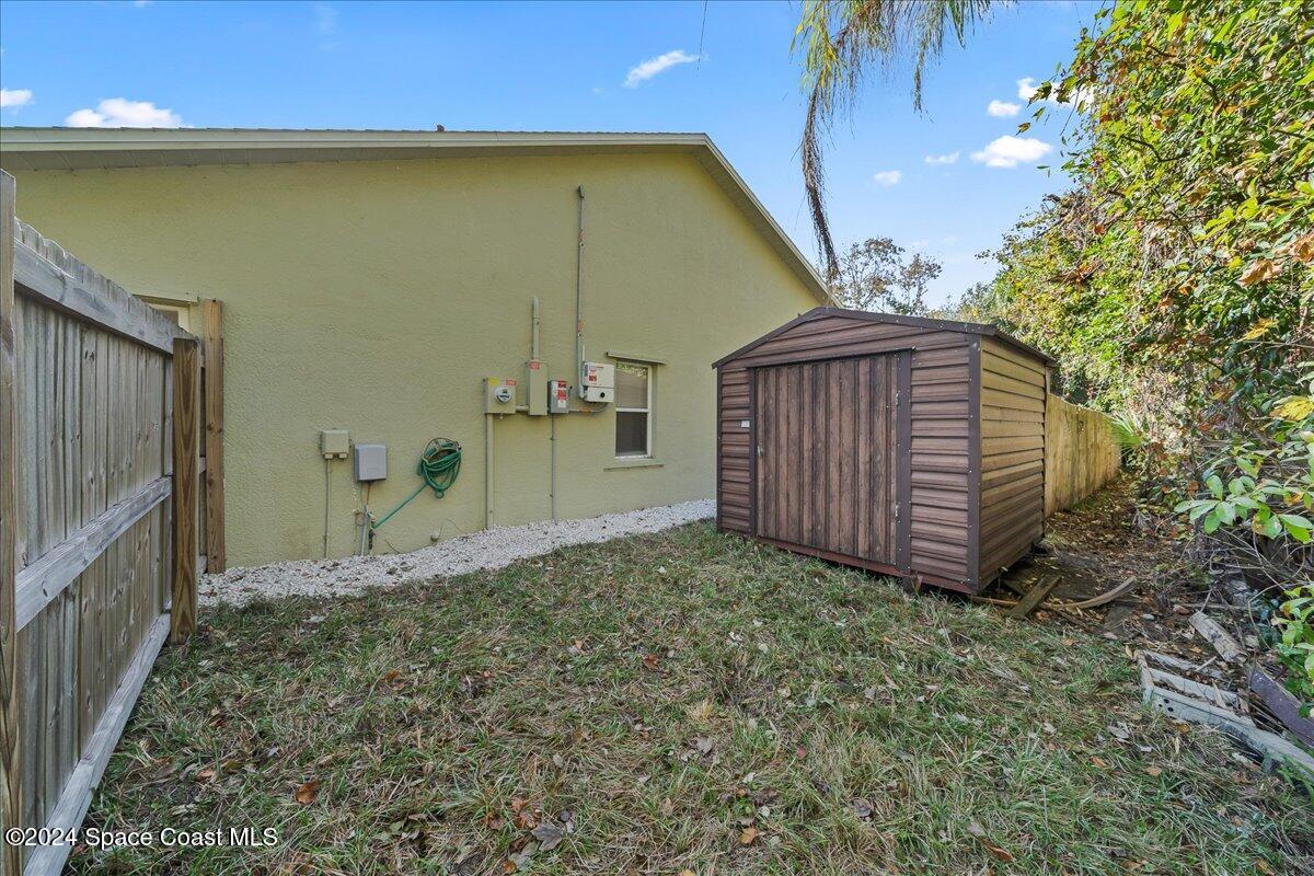 4360 Canard Road Melbourne, FL 32934 - Photo 45 of 54 a view of a backyard with pathway