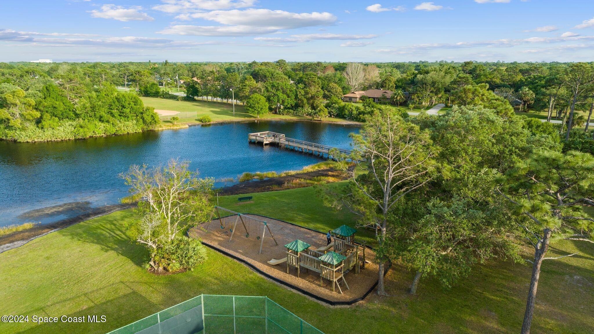 4360 Canard Road Melbourne, FL 32934 - Photo 50 of 54 a view of a lake with a big yard