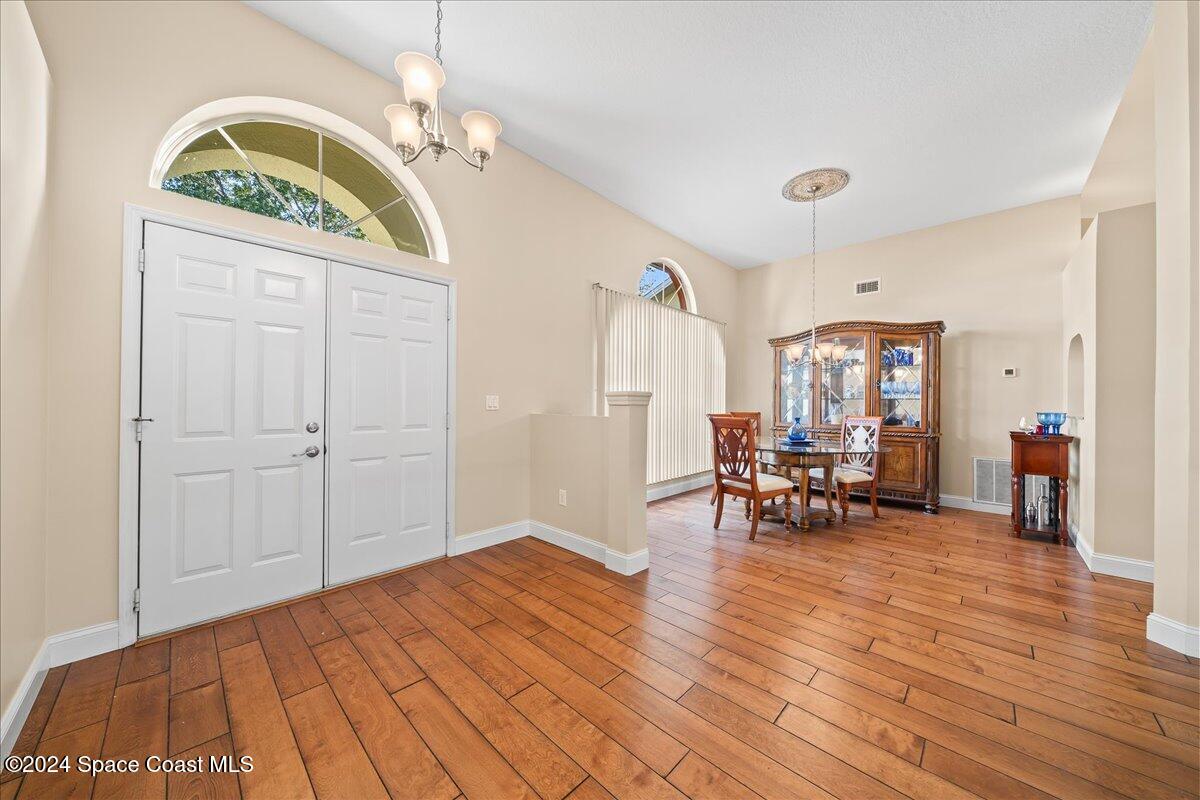 4360 Canard Road Melbourne, FL 32934 - Photo 6 of 54 a view of a livingroom with furniture and a dinning area