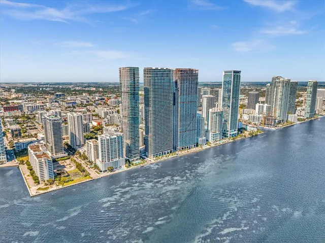 a view of a city with tall buildings