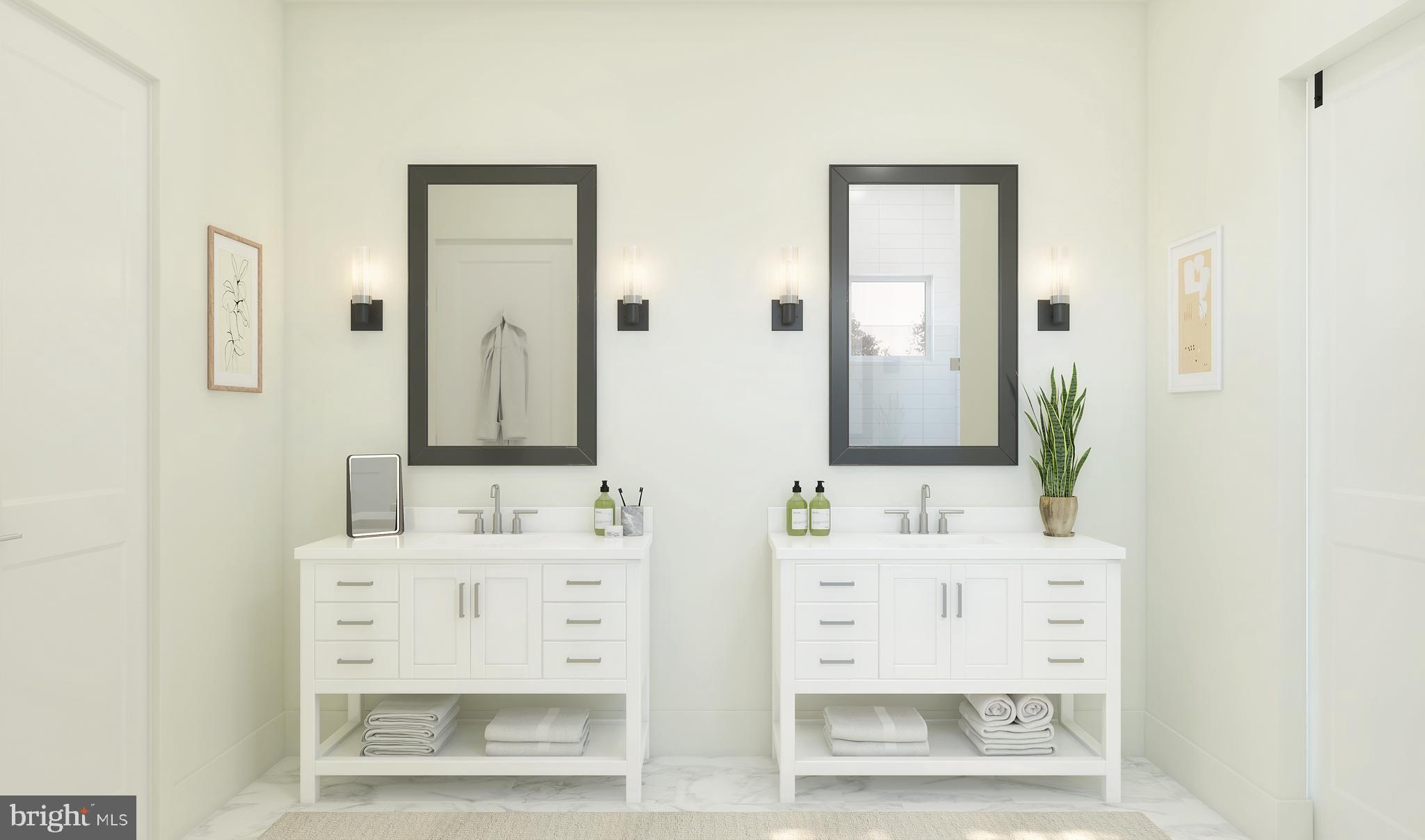 711 Warbler Way Chester, MD 21619 - Photo 11 of 38 a bathroom with double vanity sink and a mirror