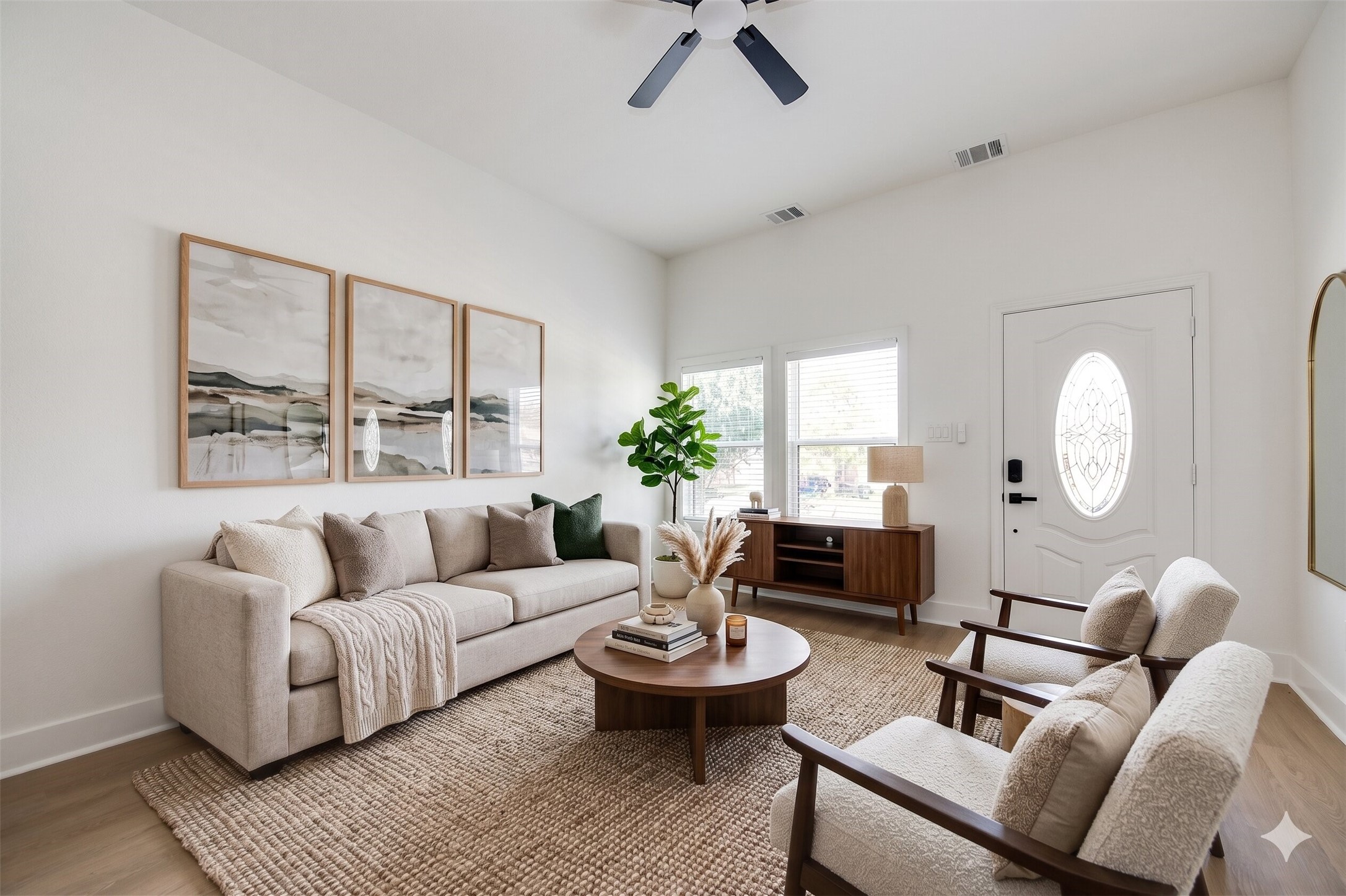 5226 Ricky Street Houston, TX 77033 - Photo 12 of 50 a living room with furniture potted plant and a large mirror