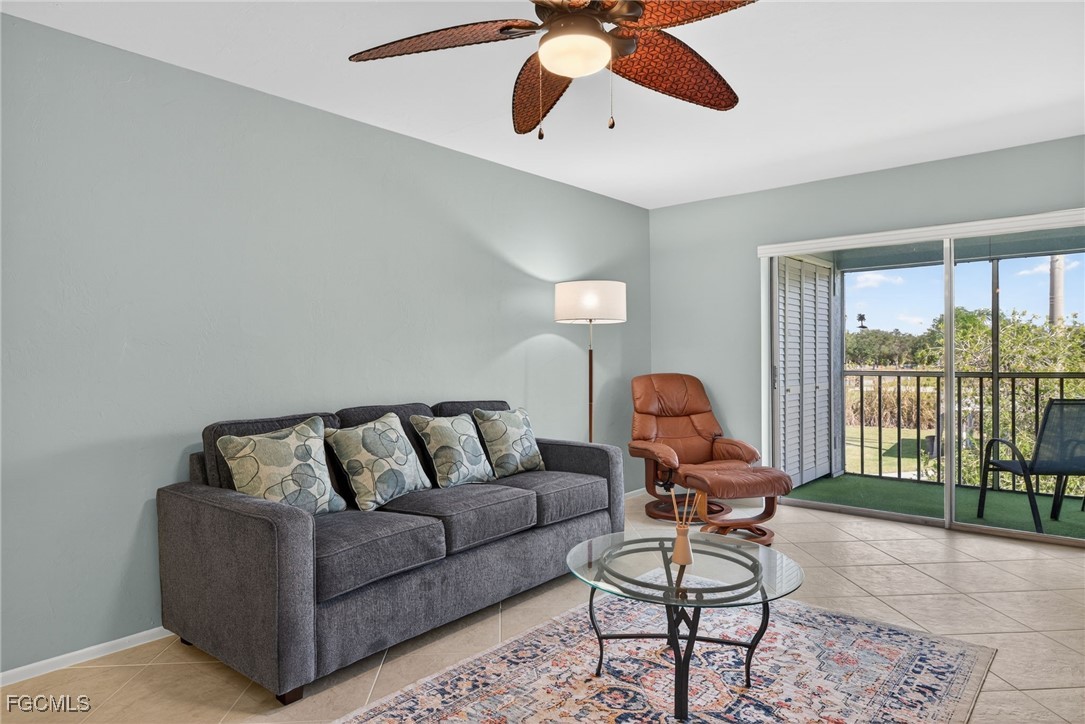 1100 Pondella Road, Unit 811 Cape Coral, FL 33909 - Photo 11 of 24 a living room with furniture