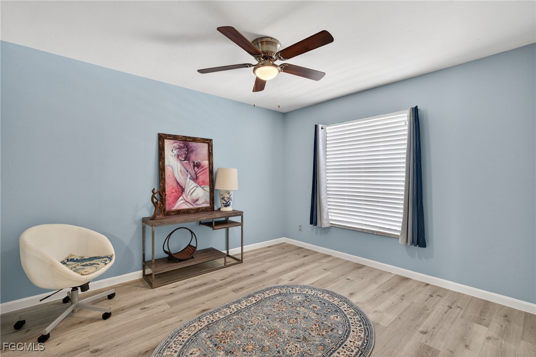 1100 Pondella Road, Unit 811 Cape Coral, FL 33909 - Photo 16 of 24 a work room with furniture and a window