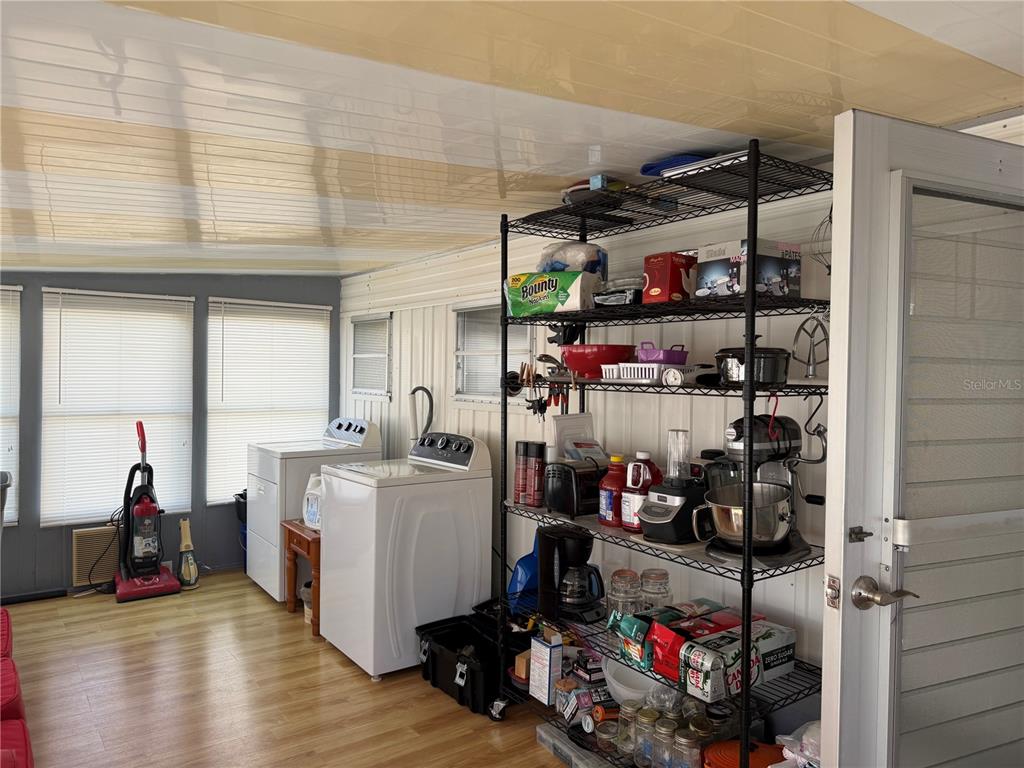 1040 Main Street, Unit 91 Dunedin, FL 34698 - Photo 3 of 25 a view of storage and utility room