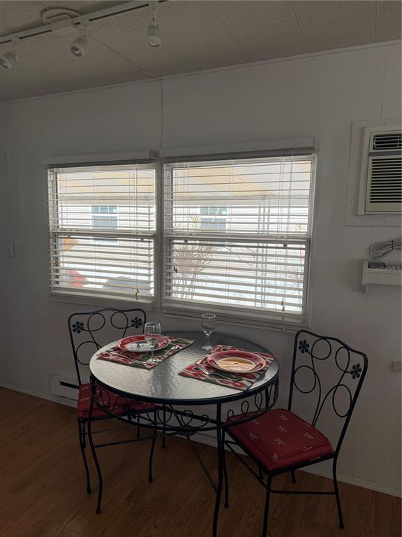 1040 Main Street, Unit 91 Dunedin, FL 34698 - Photo 9 of 25 a view of a dining room with furniture