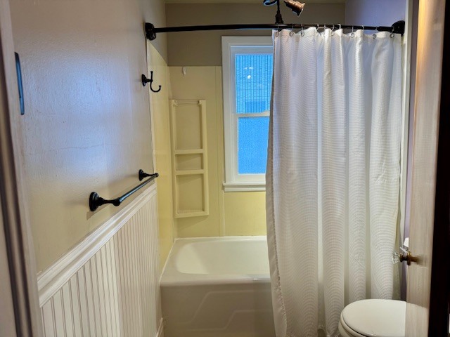 2918 Pershing Boulevard Clinton, IA 52732 - Photo 15 of 33 a bathroom with a shower and a toilet