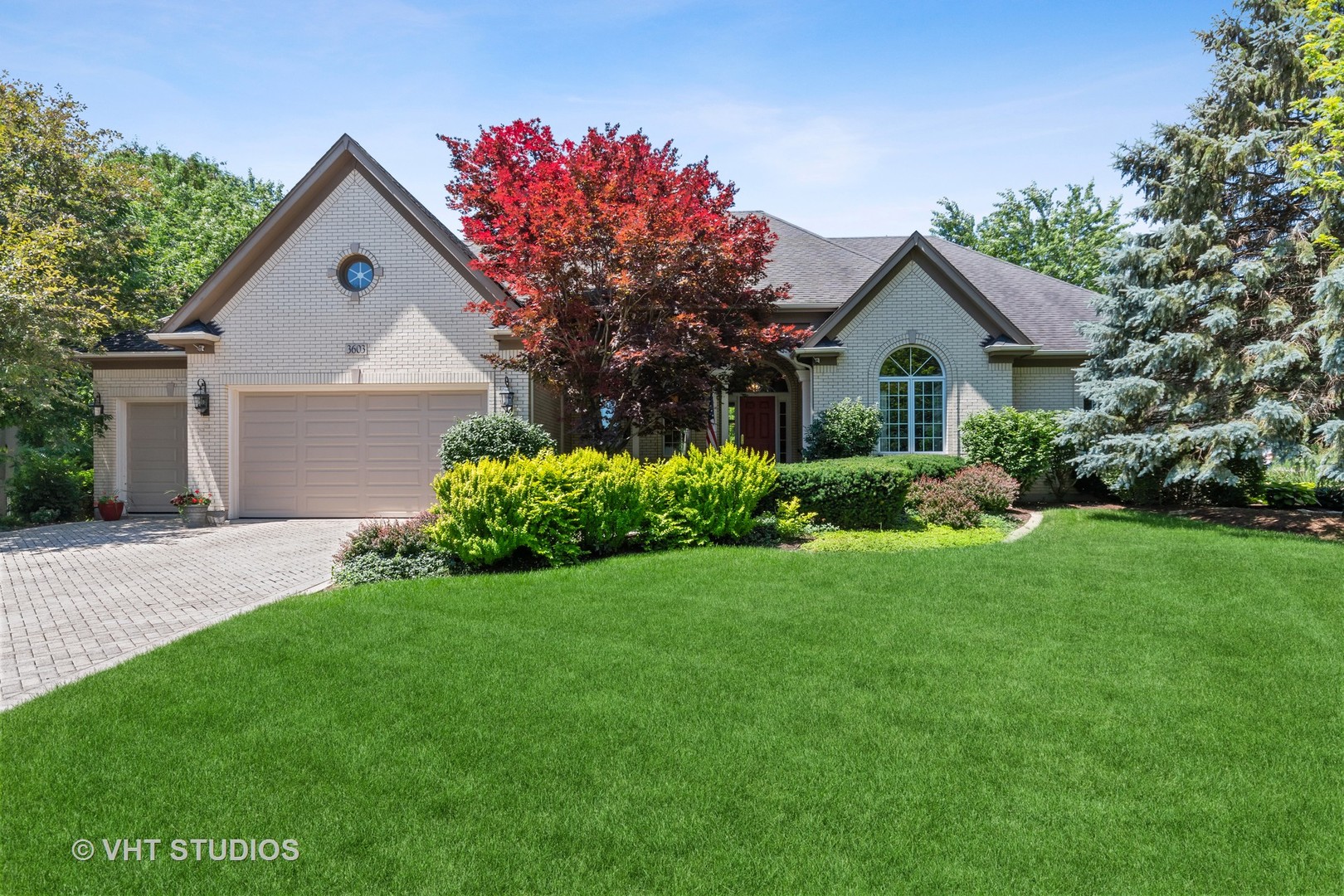 3603 Chesapeake Road St. Charles, IL 60175 - Photo 1 of 32 a front view of a house with a yard and garage