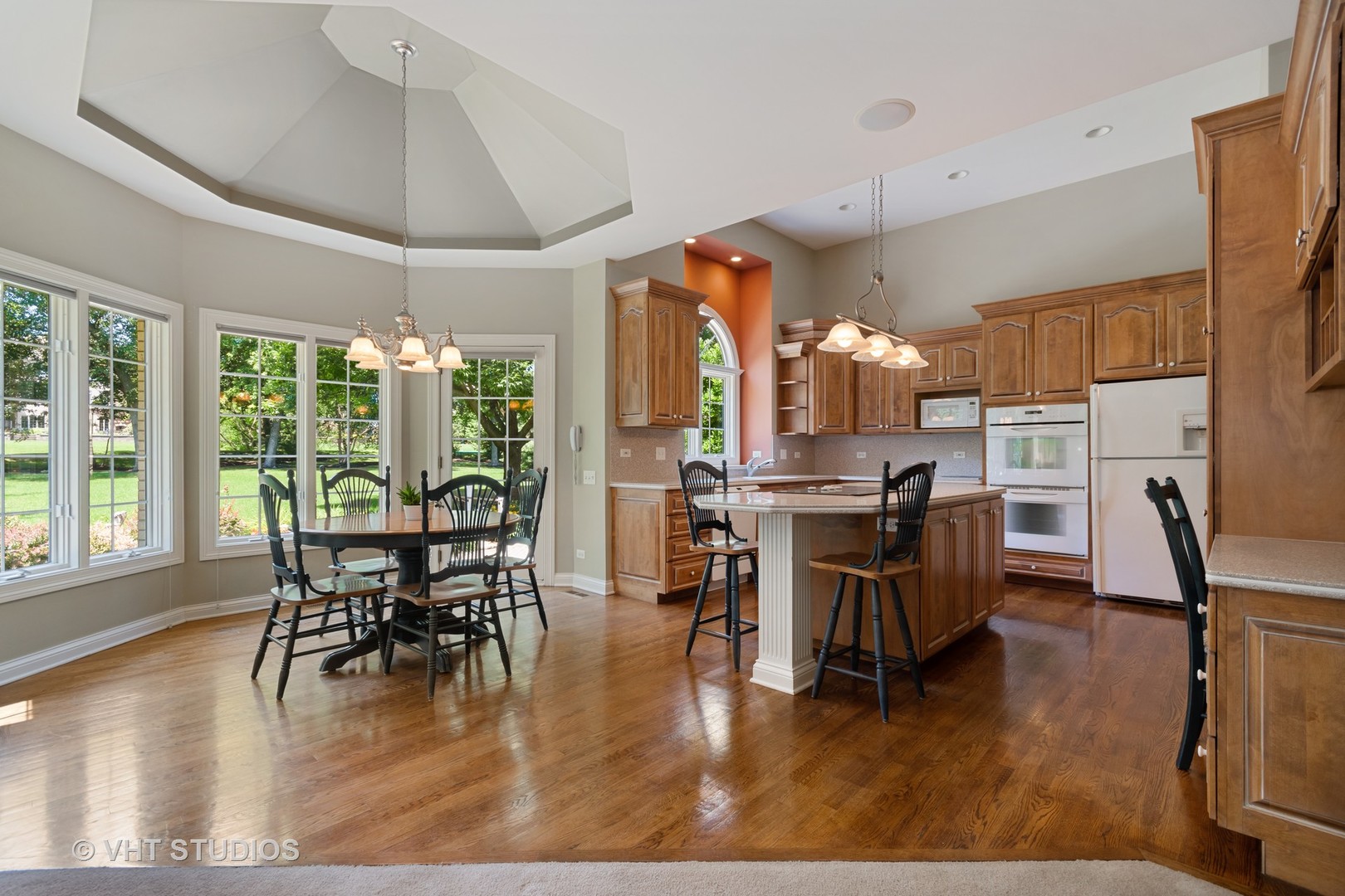 3603 Chesapeake Road St. Charles, IL 60175 - Photo 11 of 32 a view of a dining room with furniture window and wooden floor