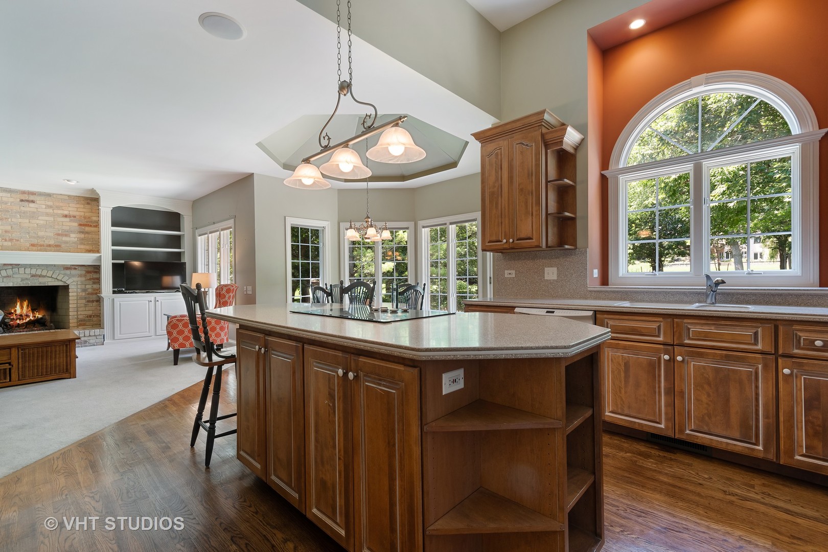 3603 Chesapeake Road St. Charles, IL 60175 - Photo 13 of 32 a kitchen with stainless steel appliances granite countertop a sink a stove and a wooden floors