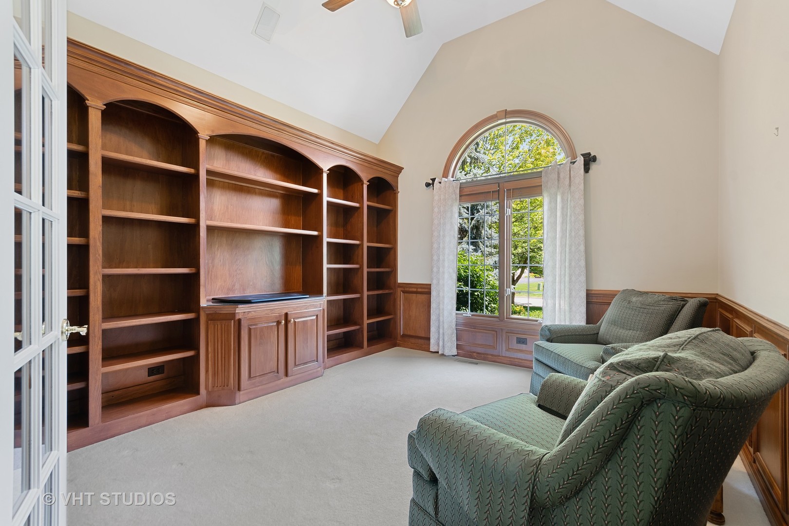 3603 Chesapeake Road St. Charles, IL 60175 - Photo 16 of 32 a living room with furniture cabinets and window