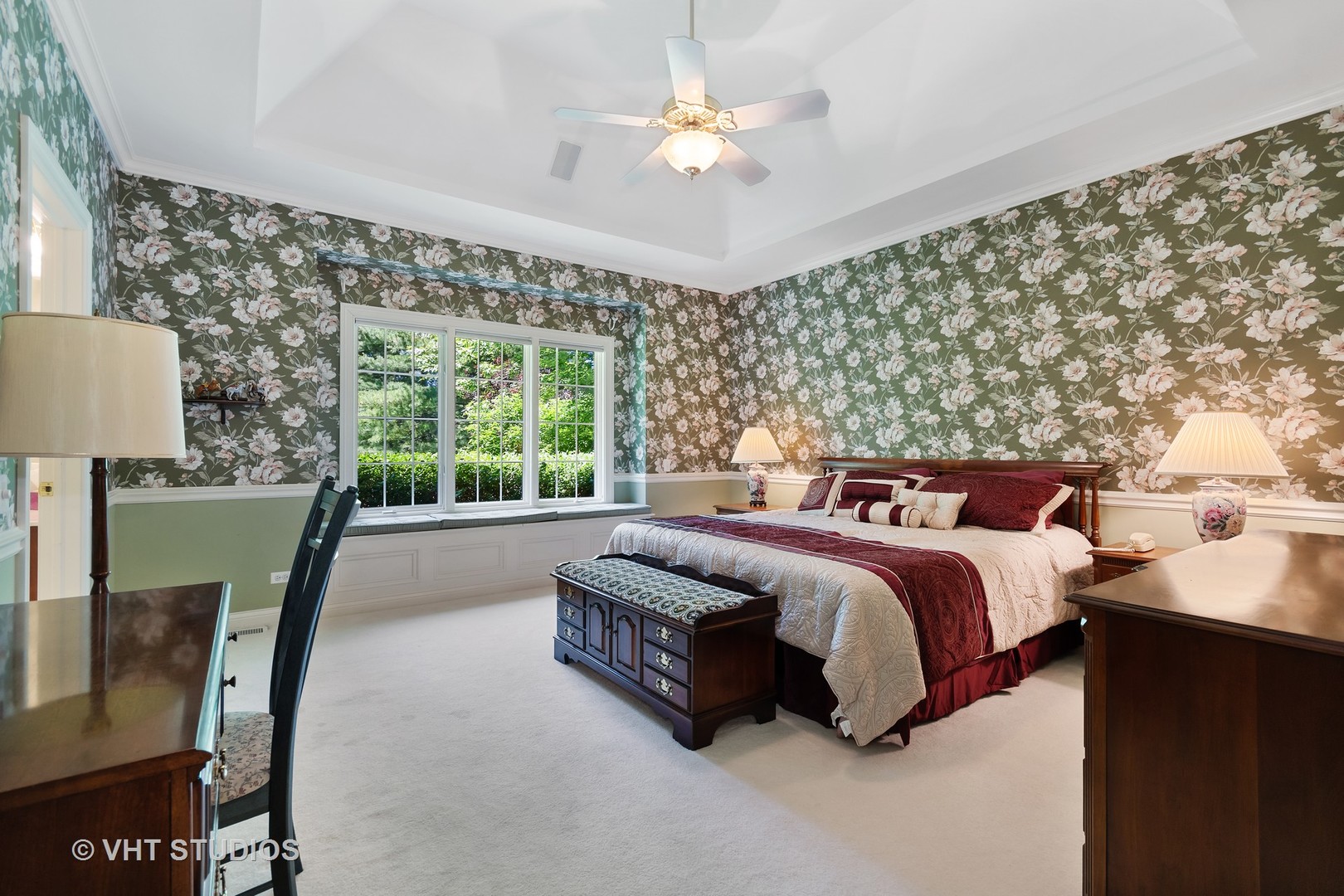 3603 Chesapeake Road St. Charles, IL 60175 - Photo 17 of 32 a spacious bedroom with a bed a window and a chandelier