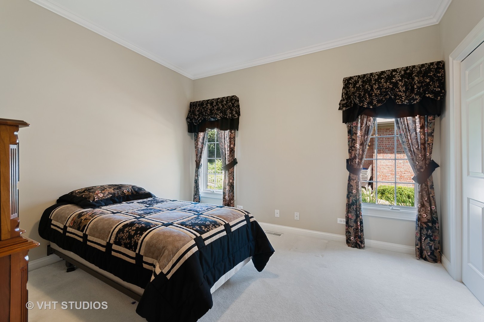 3603 Chesapeake Road St. Charles, IL 60175 - Photo 19 of 32 a bedroom with a bed and a lamp