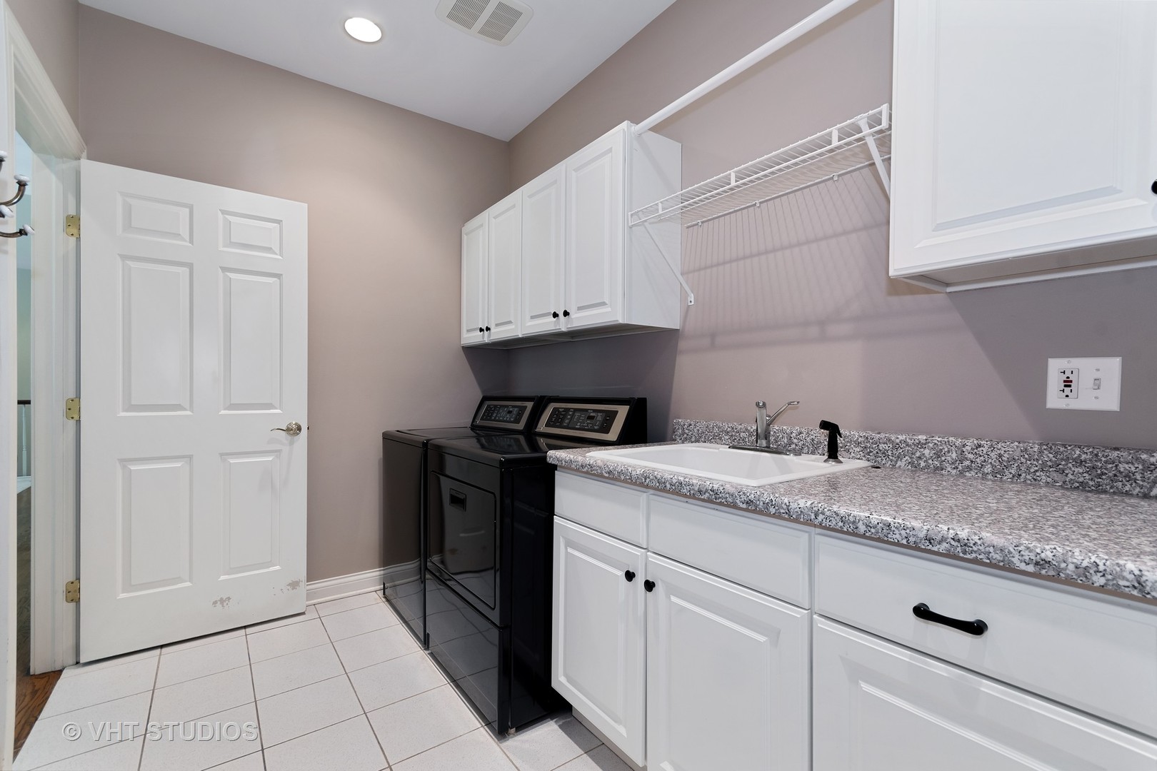 3603 Chesapeake Road St. Charles, IL 60175 - Photo 22 of 32 a kitchen with a sink and cabinets