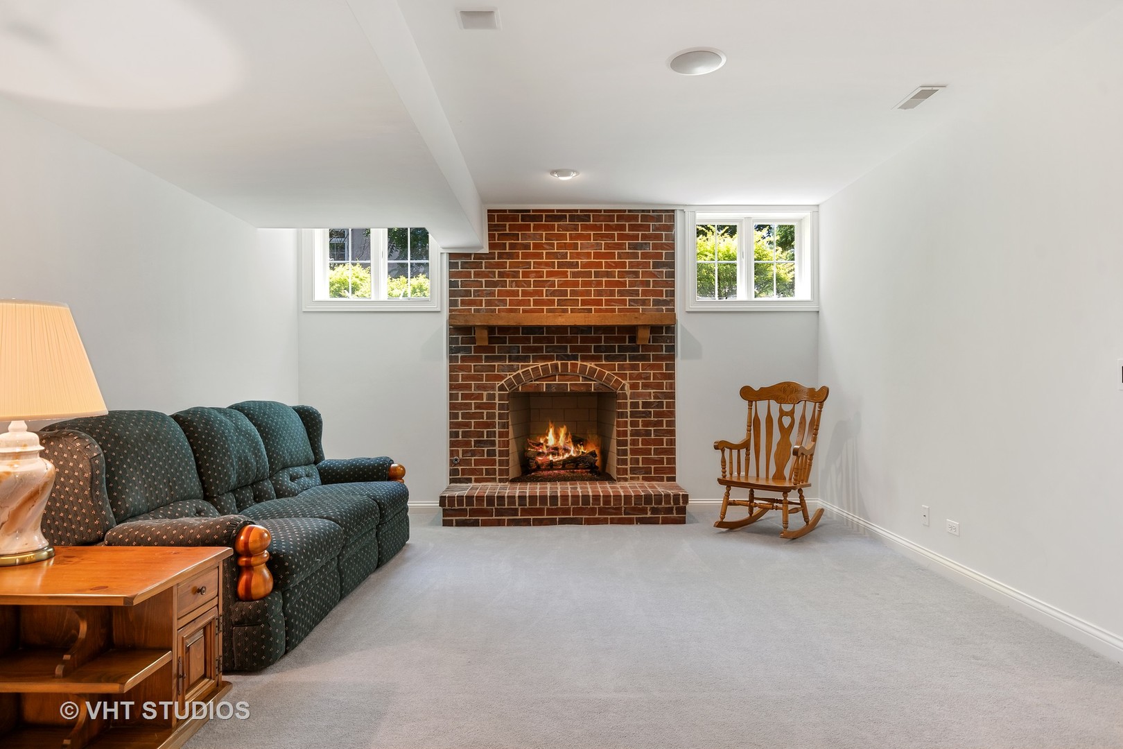 3603 Chesapeake Road St. Charles, IL 60175 - Photo 25 of 32 a living room with furniture a fireplace and a window