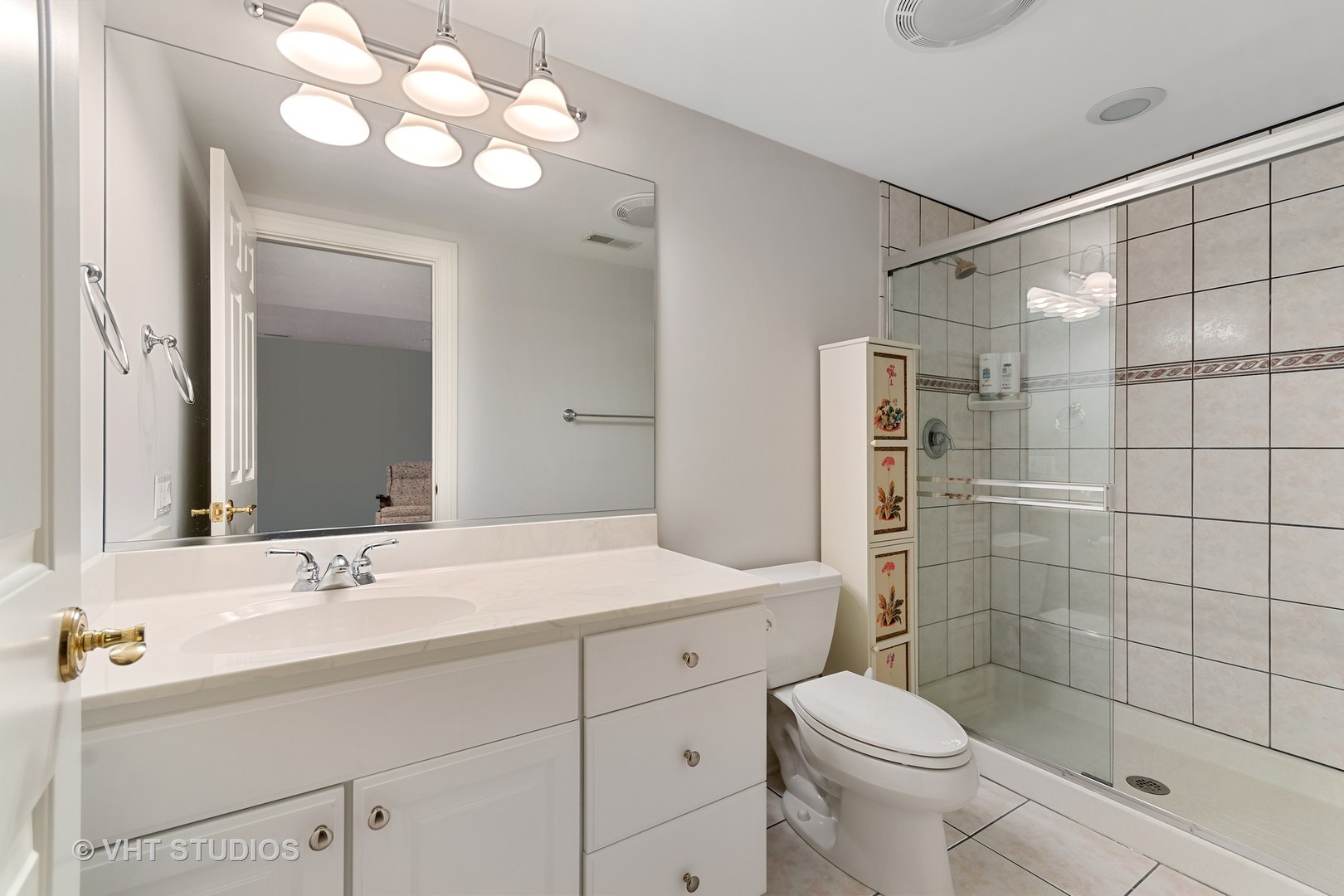 3603 Chesapeake Road St. Charles, IL 60175 - Photo 26 of 32 a bathroom with a sink toilet and shower
