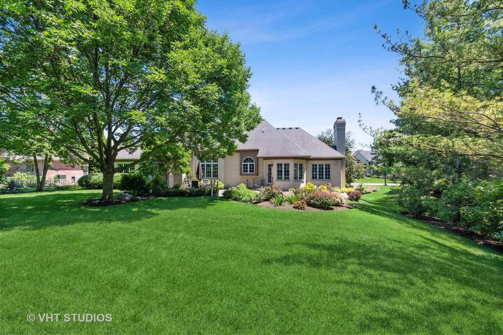 3603 Chesapeake Road St. Charles, IL 60175 - Photo 27 of 32 a front view of a house with yard and green space