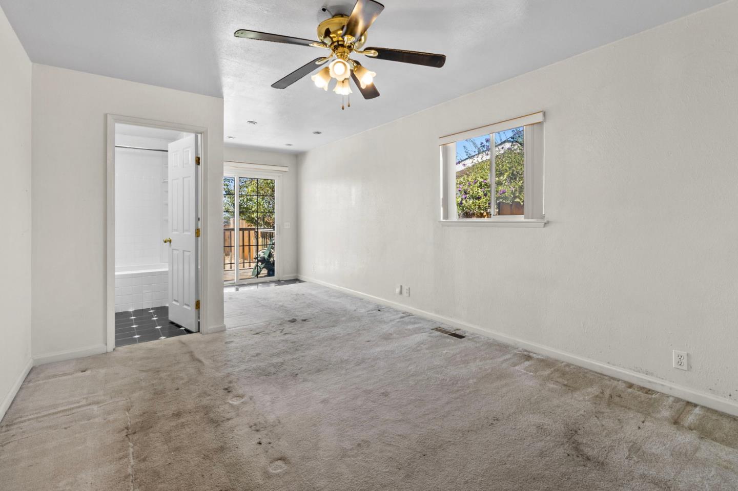 1949 Lincoln Street Seaside, CA 93955 - Photo 21 of 40 an empty room with fan and a ceiling fan