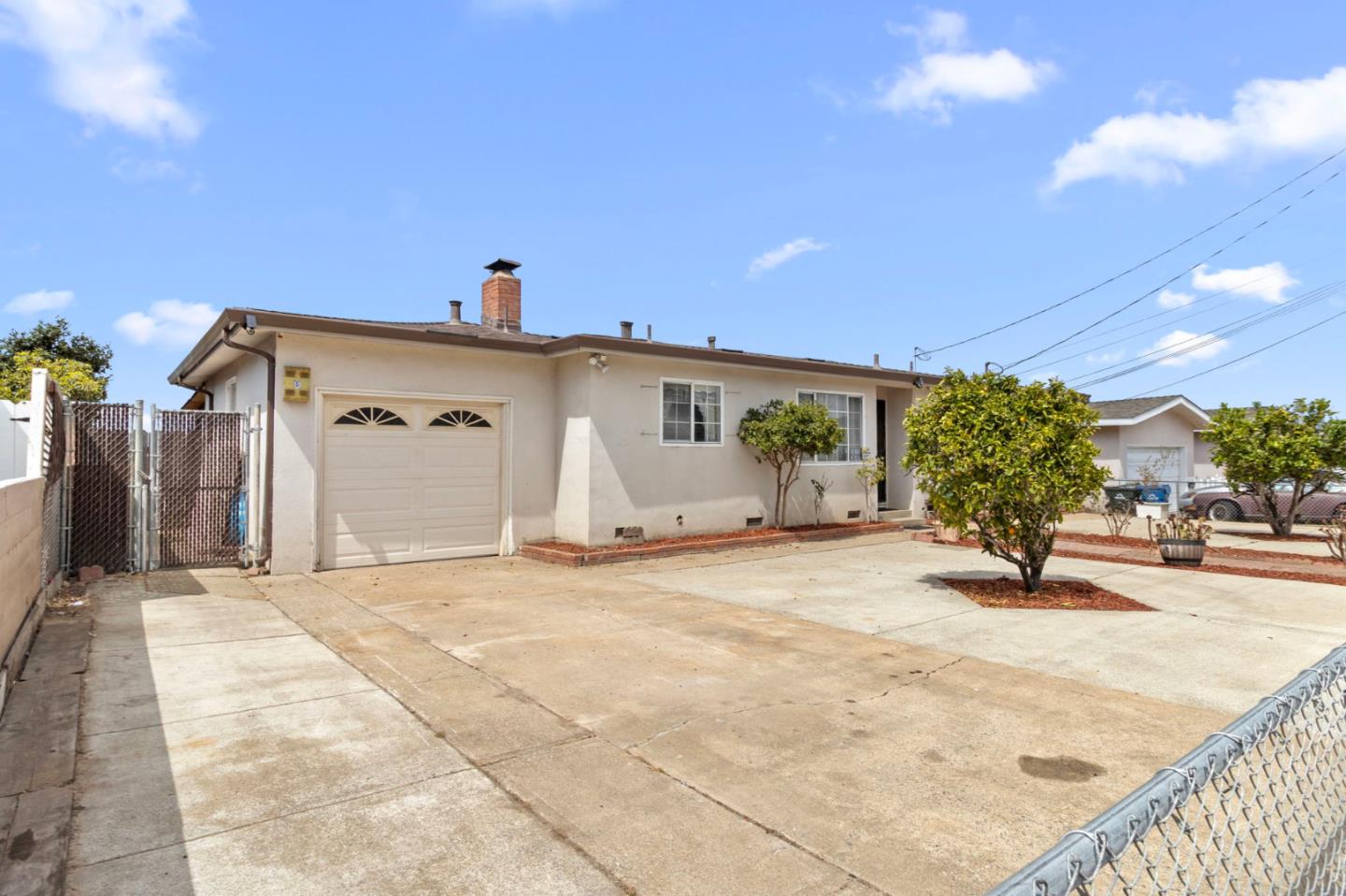 1949 Lincoln Street Seaside, CA 93955 - Photo 3 of 40 a view of a house with a snow in front of it