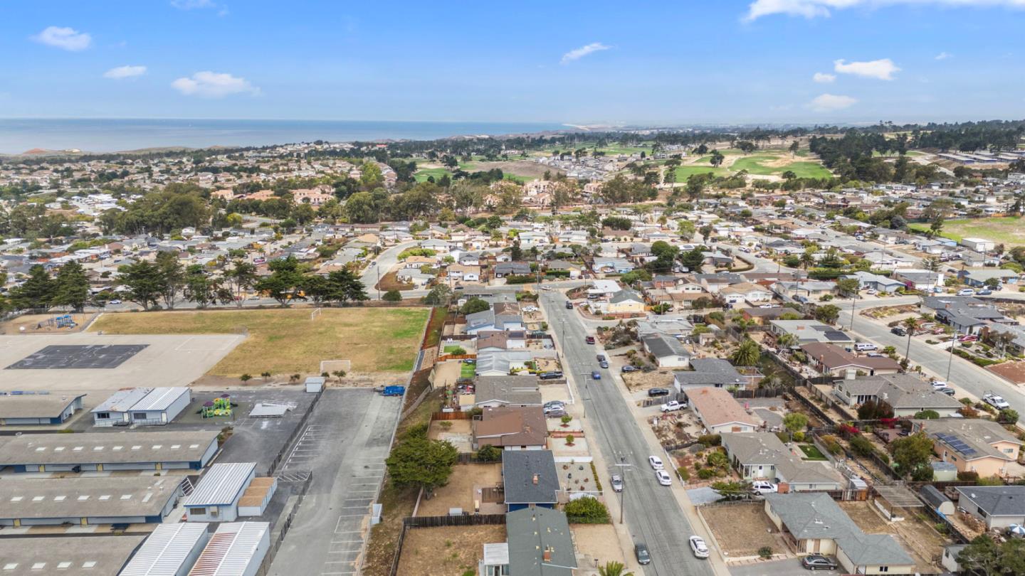1949 Lincoln Street Seaside, CA 93955 - Photo 37 of 40 an aerial view of residential building with parking space
