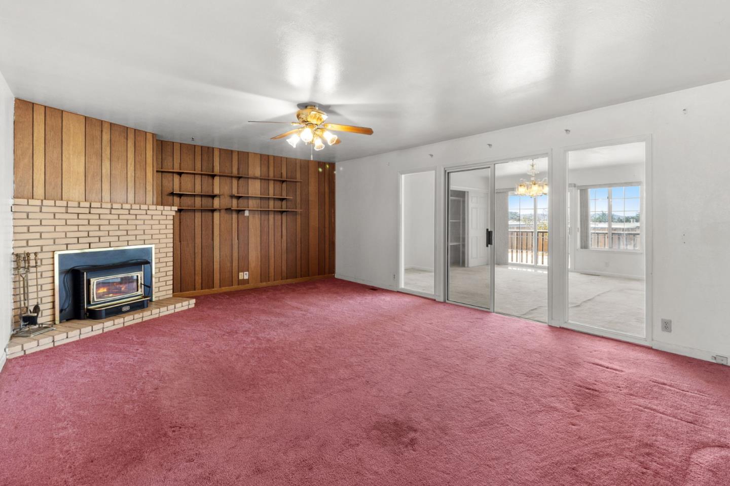 1949 Lincoln Street Seaside, CA 93955 - Photo 9 of 40 a view of an empty room with a fireplace