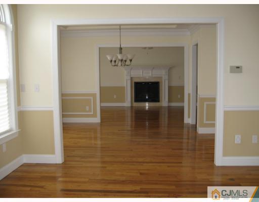 1001 Old Mill Road Spring Lake Heights, NJ 07762 - Photo 3 of 10 a view of a livingroom with a fireplace