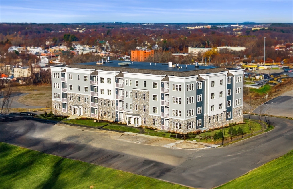 6 Stratton Drive, Unit 3303 Woburn, MA 01801 - Photo 27 of 30 a view of a city with tall buildings