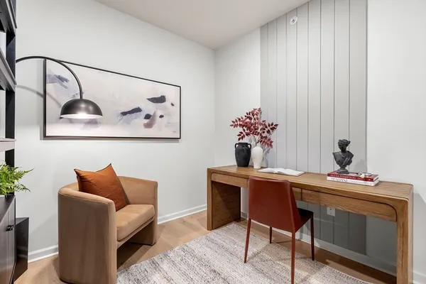 a view of a workspace with furniture