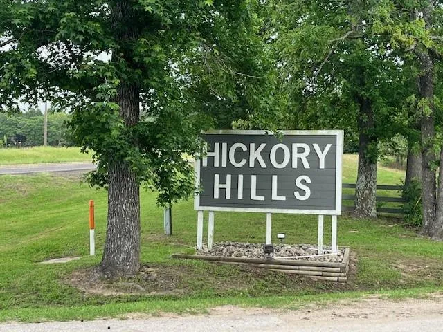 a sign that is on the side of a road