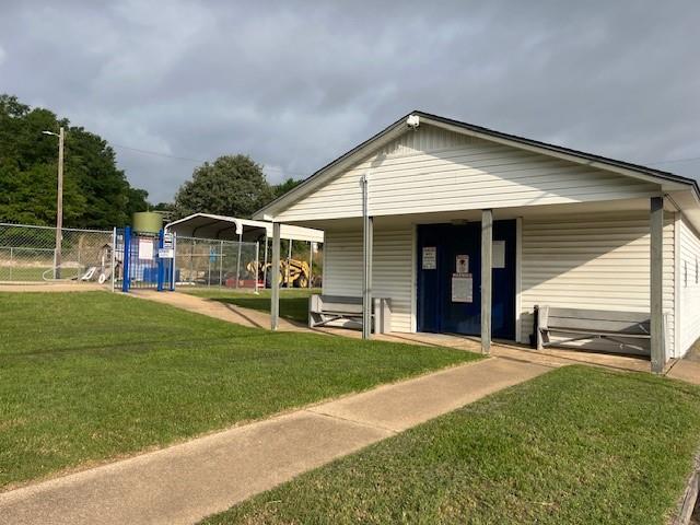 Tbd East Walnut Trail Murchison, TX 75778 - Photo 5 of 12 a front view of a house with garden