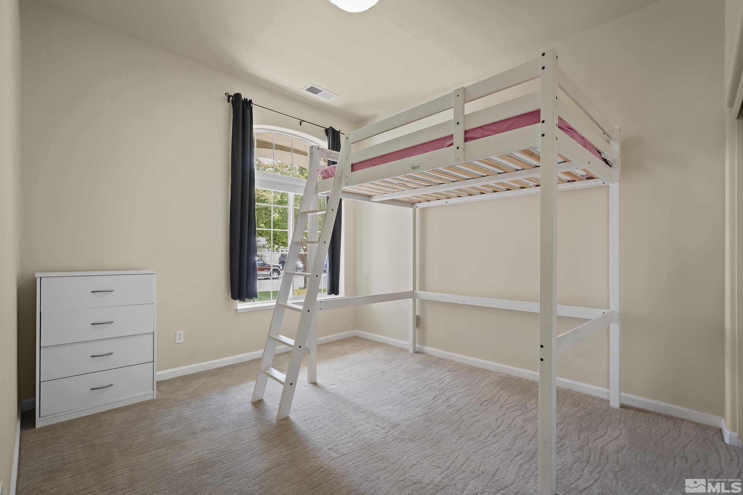 1615 Sewell Drive Reno, NV 89521 - Photo 16 of 25 a view of an empty room with a windows