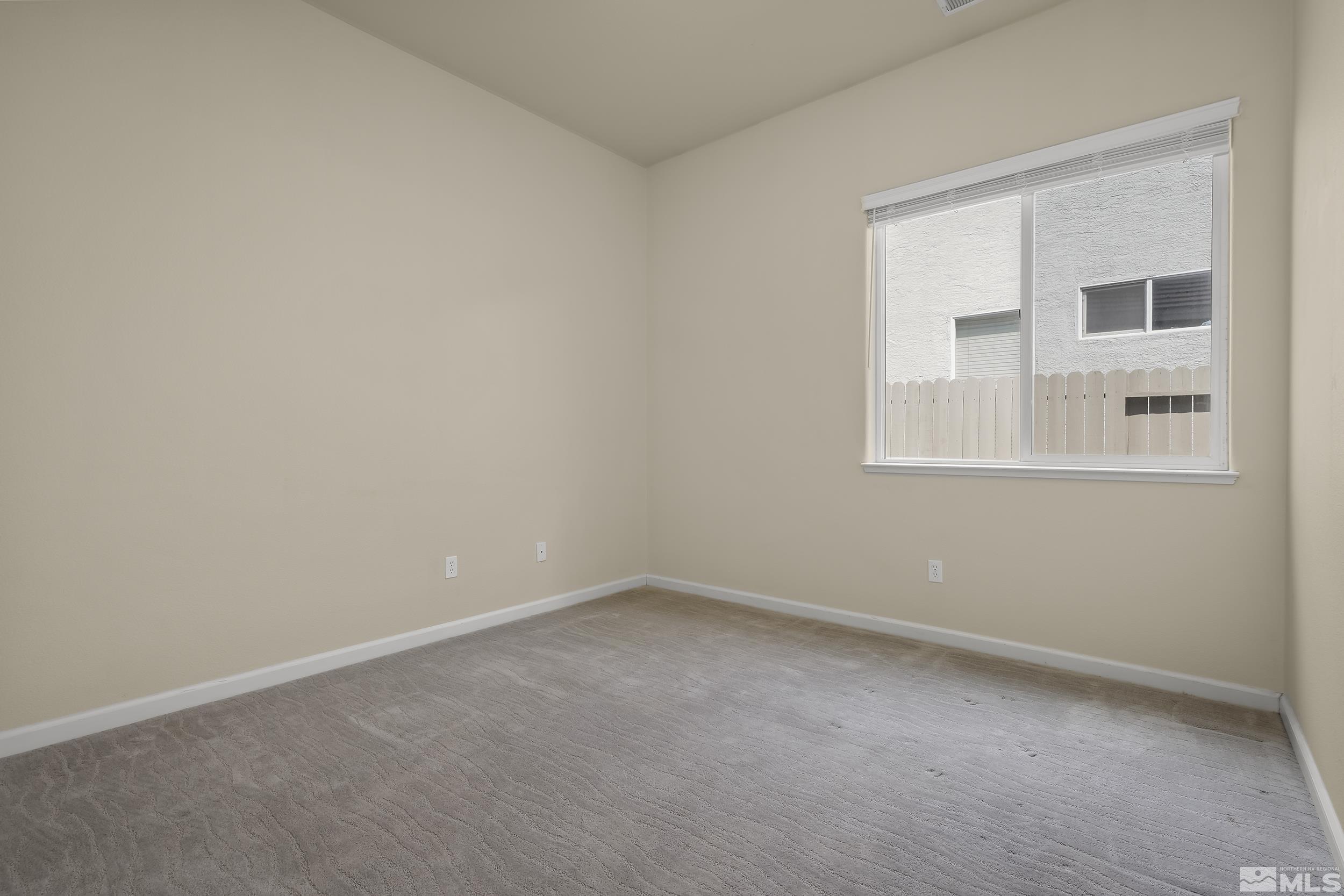 1615 Sewell Drive Reno, NV 89521 - Photo 17 of 25 an empty room with a window
