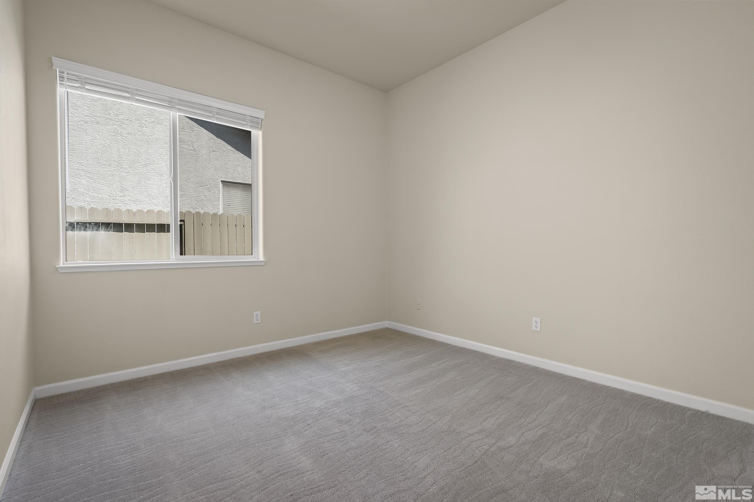 1615 Sewell Drive Reno, NV 89521 - Photo 19 of 25 a view of an empty room with a window