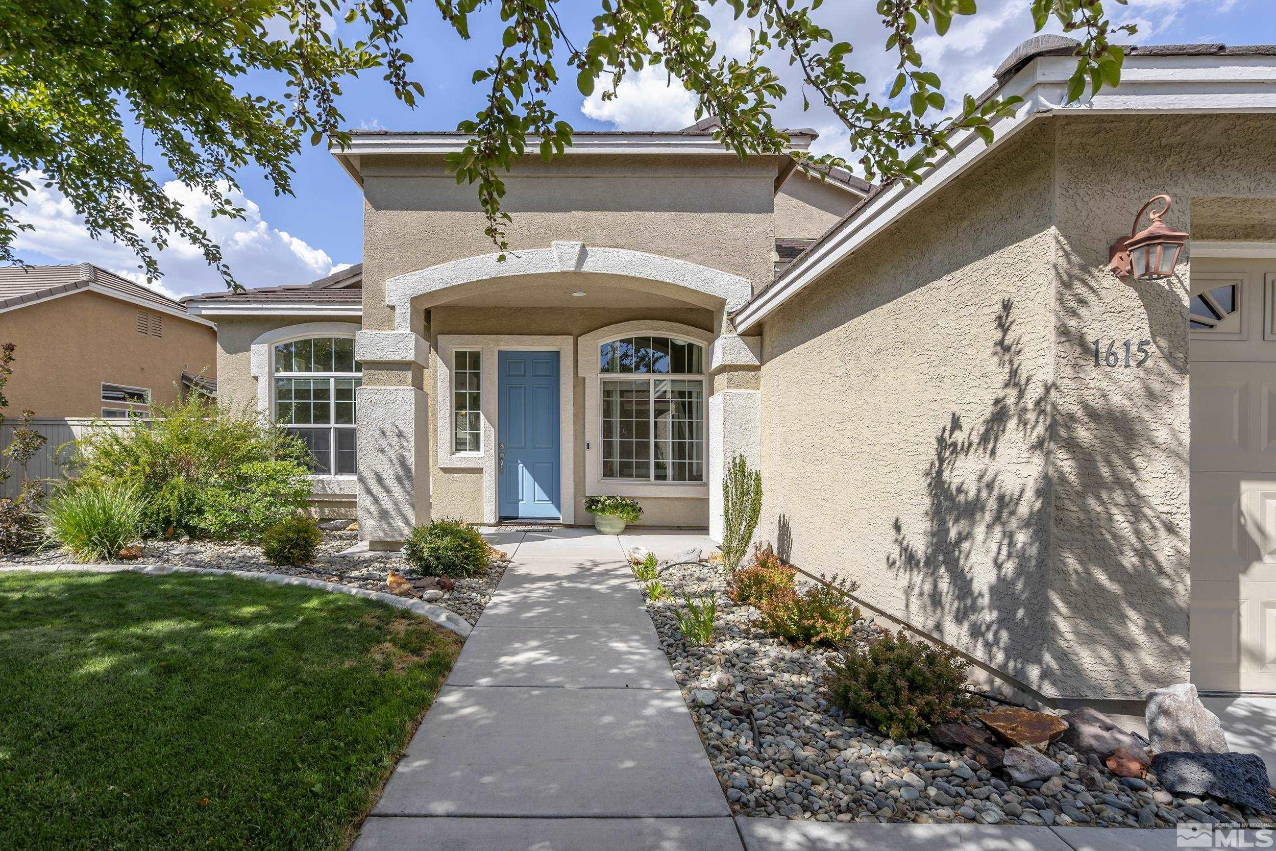 1615 Sewell Drive Reno, NV 89521 - Photo 2 of 25 a front view of a house with garden