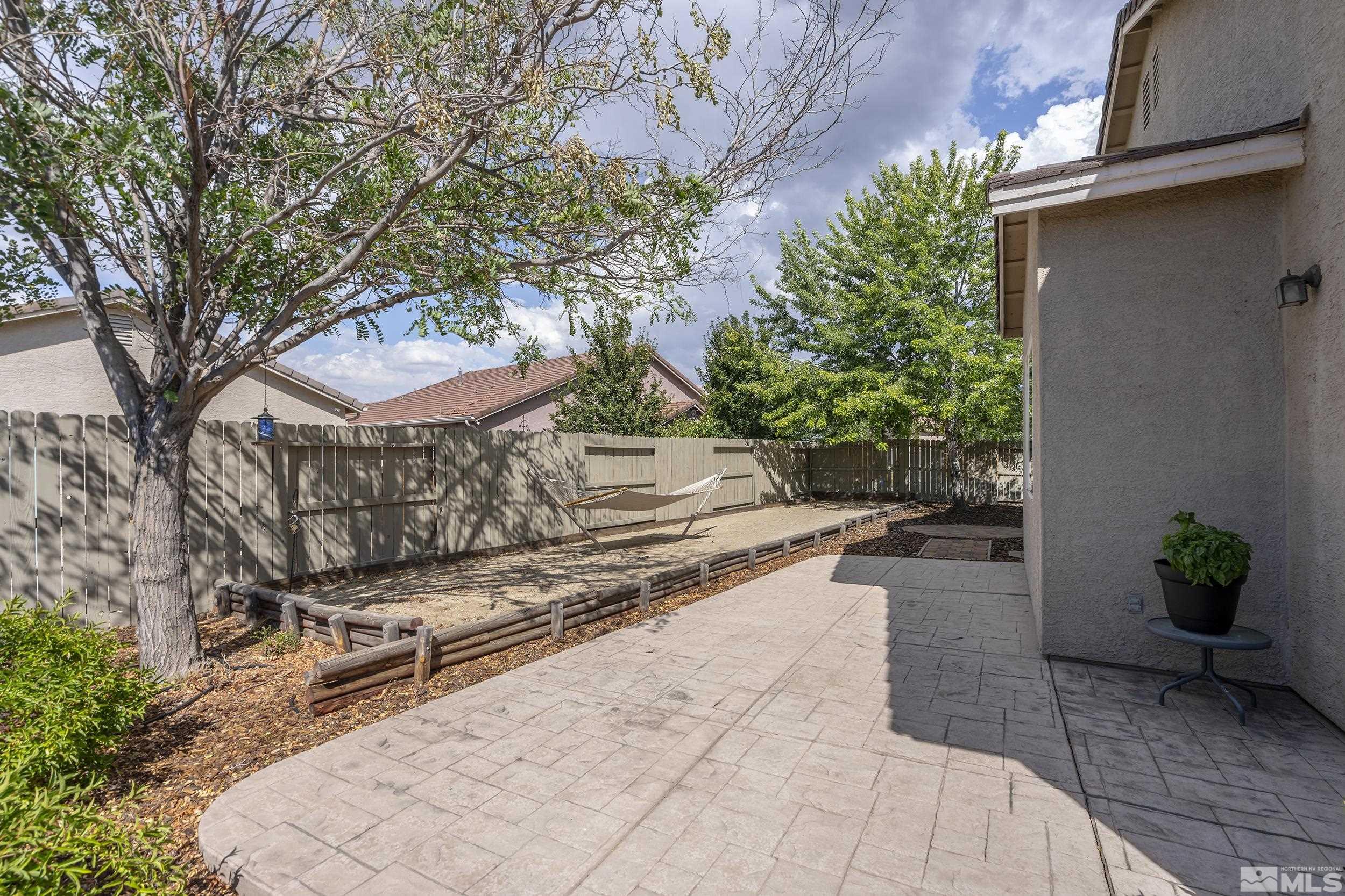 1615 Sewell Drive Reno, NV 89521 - Photo 21 of 25 a view of a backyard with sitting area